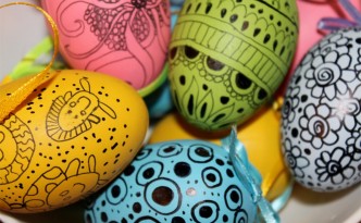 Easter eggs painted with crayon, marker, wax crayons, paints